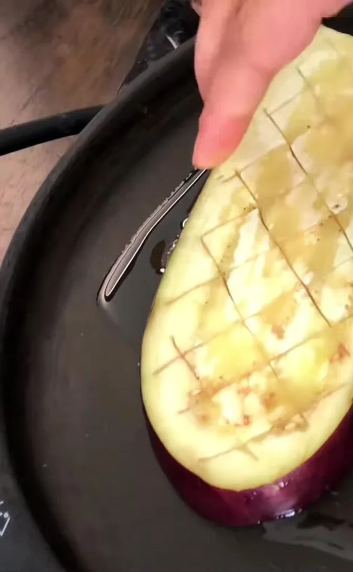 Heat oil in a pan over medium heat. Cook the eggplant slices until golden brown and buttery soft.