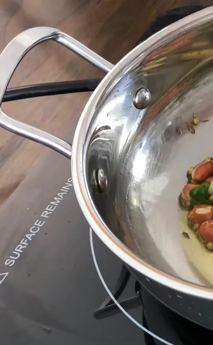 Add garlic and hing. Stir-fry briefly.
