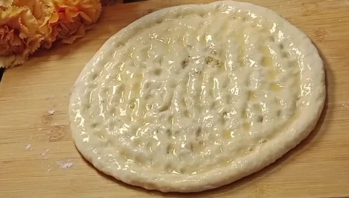 Apply egg wash: Brush each naan with a beaten egg (162.48).