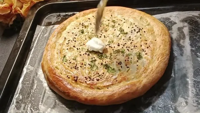 Bake: Place the naan on a baking sheet lined with butter paper. Bake in a preheated oven at 180°C (356°F) for 30-40 minutes (188.8).