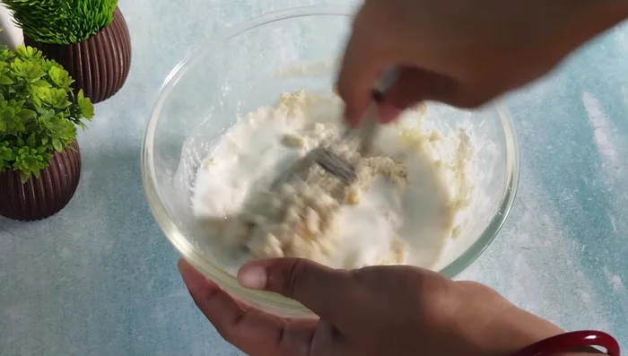 Continue adding milk until a smooth, lump-free batter is formed. Whisk for 4-5 minutes to ensure smoothness.