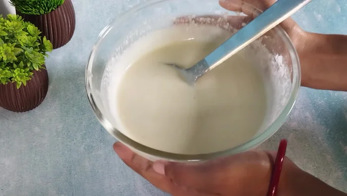 Heat oil in a pan. Using a ladle, drop spoonfuls of batter into the hot oil, leaving space between each.