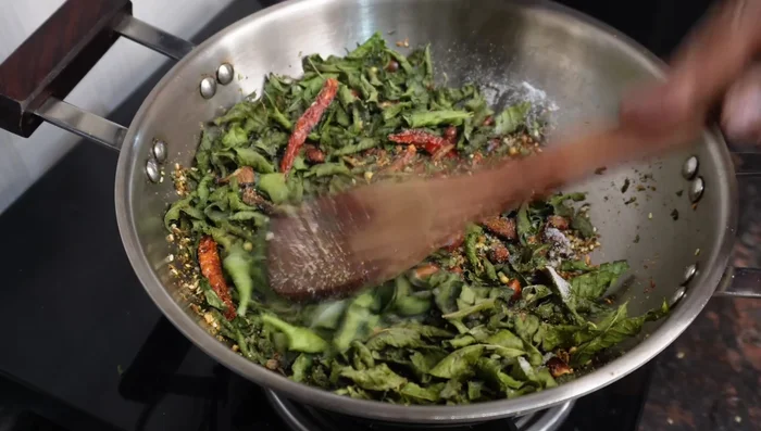 Add salt and allow the mixture to cool completely before grinding.