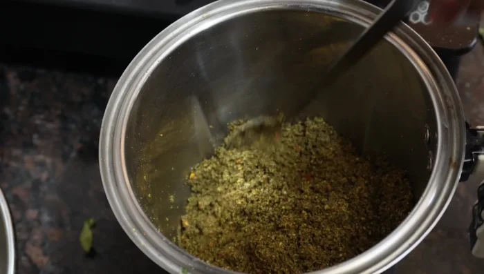 Grind the mixture into a coarse powder using a grinder. Add black salt to taste and grind again until well combined.
