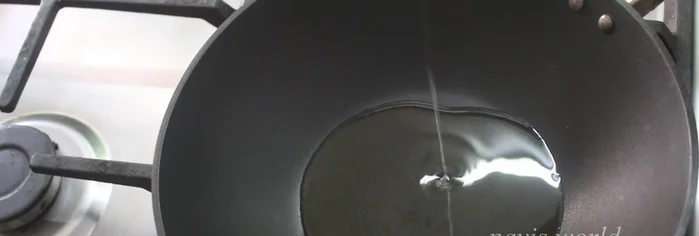 Heat sunflower oil in a pan.