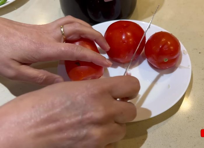 Add chopped tomatoes, turmeric powder, dried coriander powder, and red chili powder. Cook until tomatoes soften (233.28).