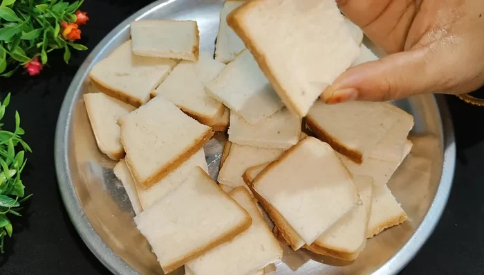 Cut bread into small pieces. Do not remove the hard edges.