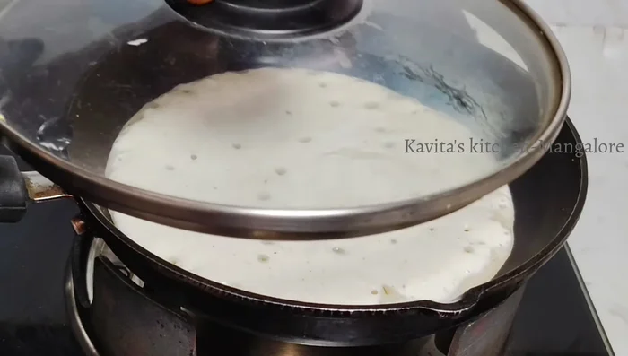 Cook until bubbles appear and the dosa is golden brown (1-2 minutes per side).
