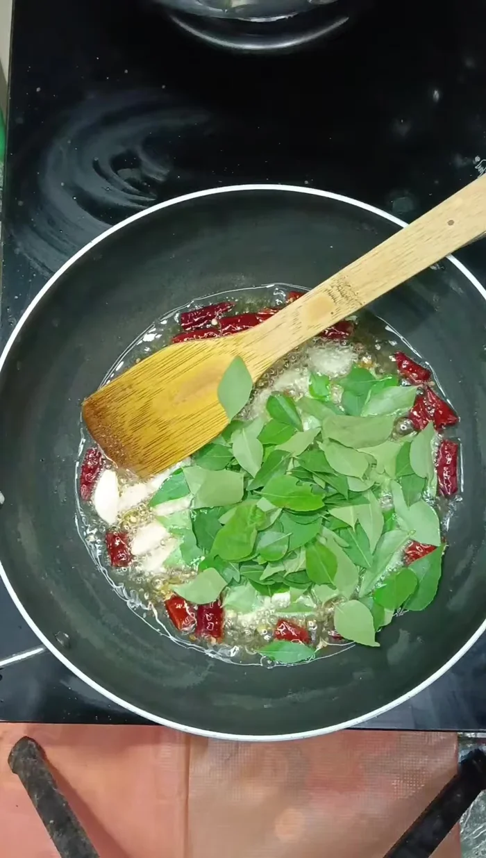 Add curry leaves.