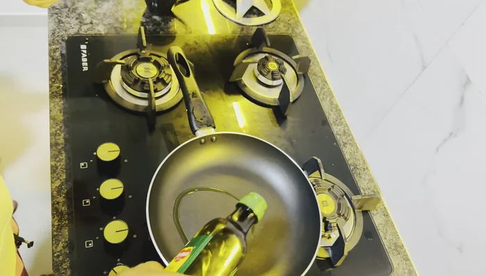 Heat olive oil in a pan.