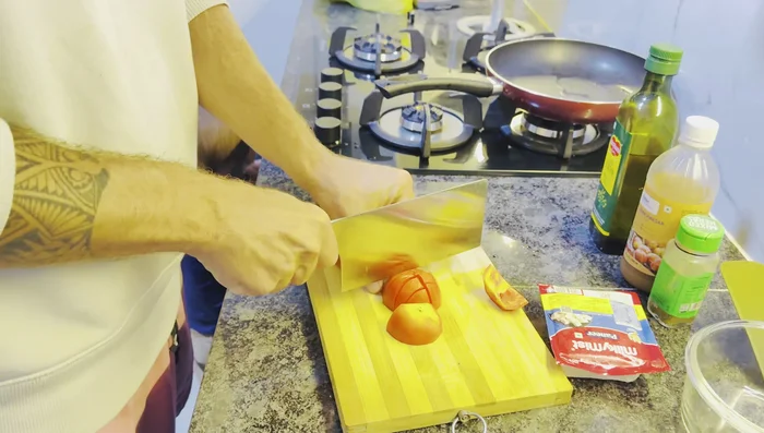 Chop tomatoes.