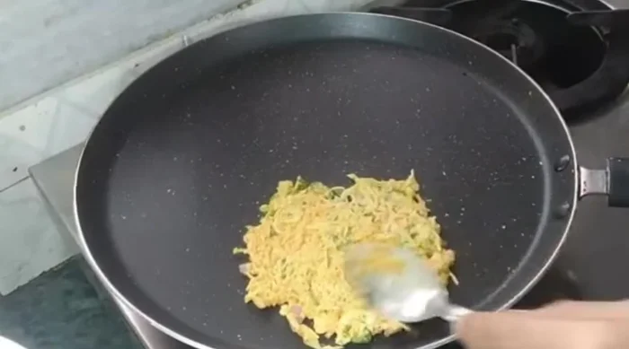 Add the vegetable mixture onto the barley pancake. Cook on low flame.