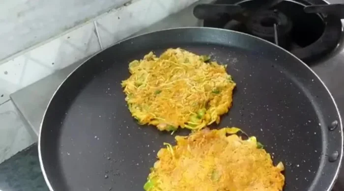 Lightly brush oil on top and flip. Cook until golden brown.