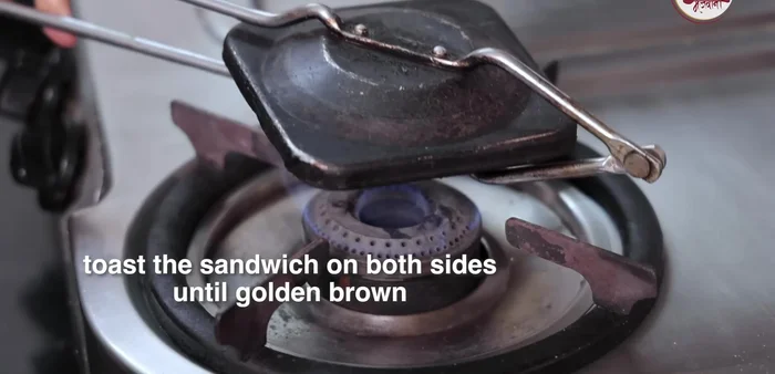 Roast the sandwich until golden brown and crispy on both sides.