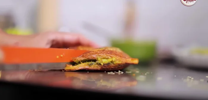Cut the sandwich into desired shapes and serve.
