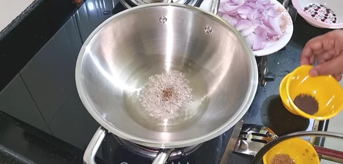 Heat oil in a frying pan. Add cumin seeds and mustard seeds, then fenugreek seeds.