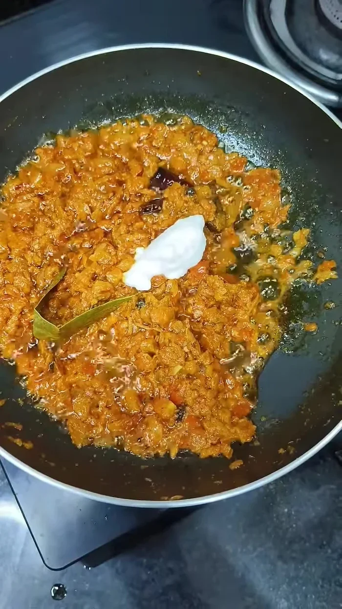 Add curd and cook well.