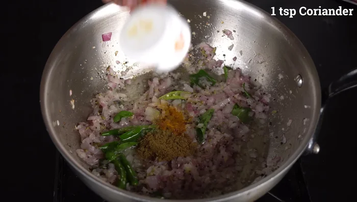 Add turmeric powder, coriander powder, chili powder, and garam masala (or meat masala).
