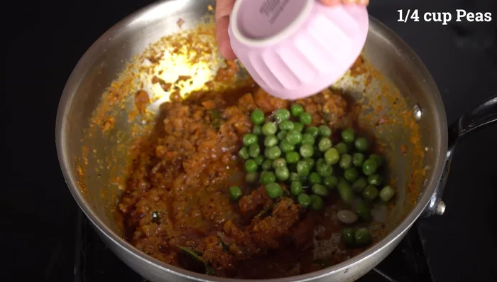 Add green peas and chopped green chilies. Stir in salt.
