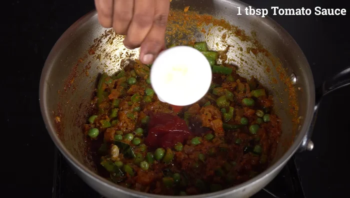 Add tomato ketchup or sauce (optional).