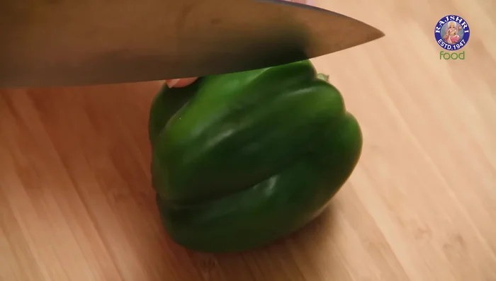 Chop the capsicums in half and deseed them, creating capsicum cups.