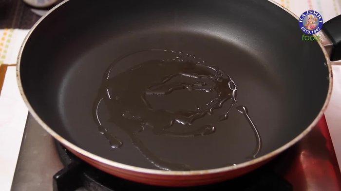 Heat some oil in a pan. Add finely chopped onions and cook for a few seconds.