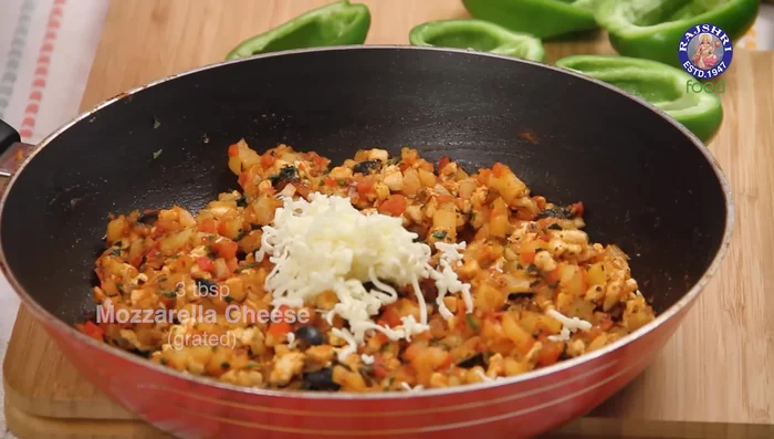 Add mozzarella cheese to the cooled filling and mix well.