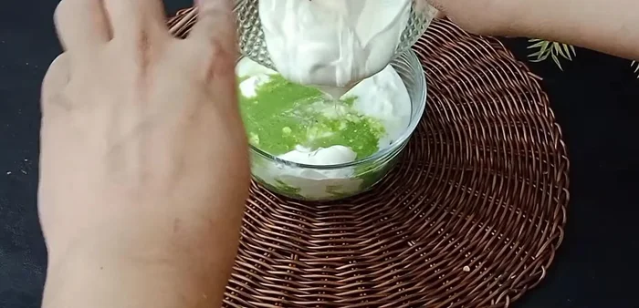 Mix the chutney with yogurt and fresh cream. Beat well until smooth.