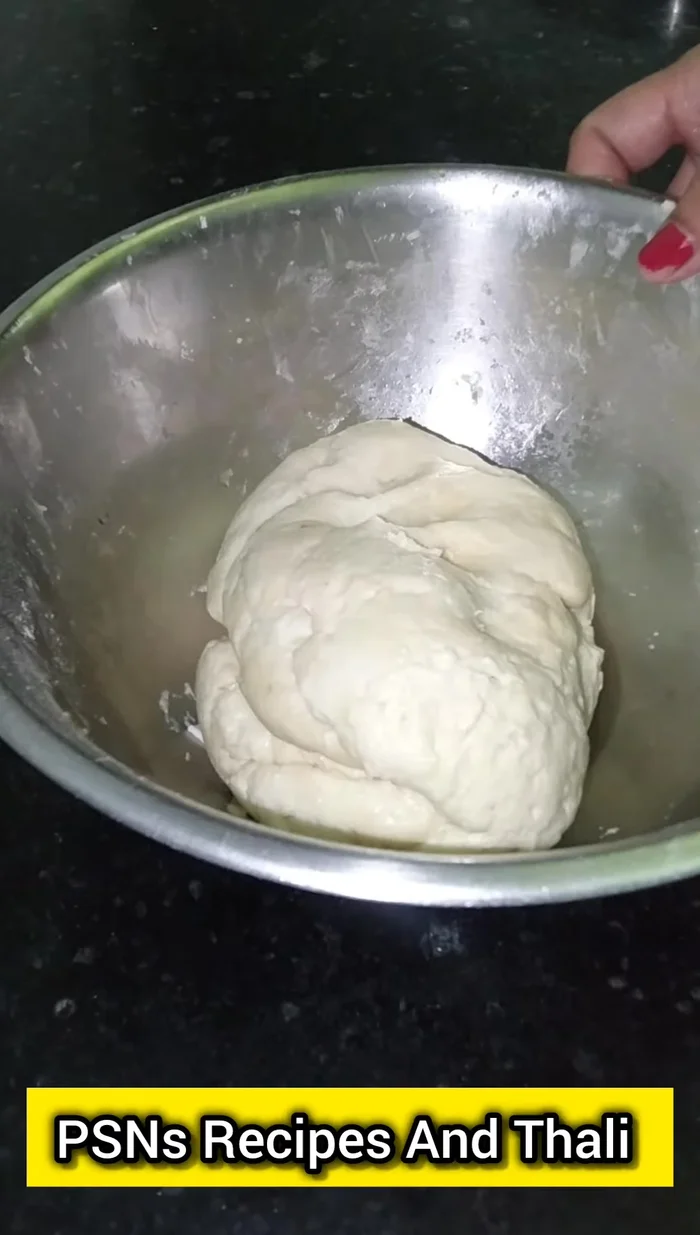 After resting, dust the dough with flour and lightly knead again. (115.04)