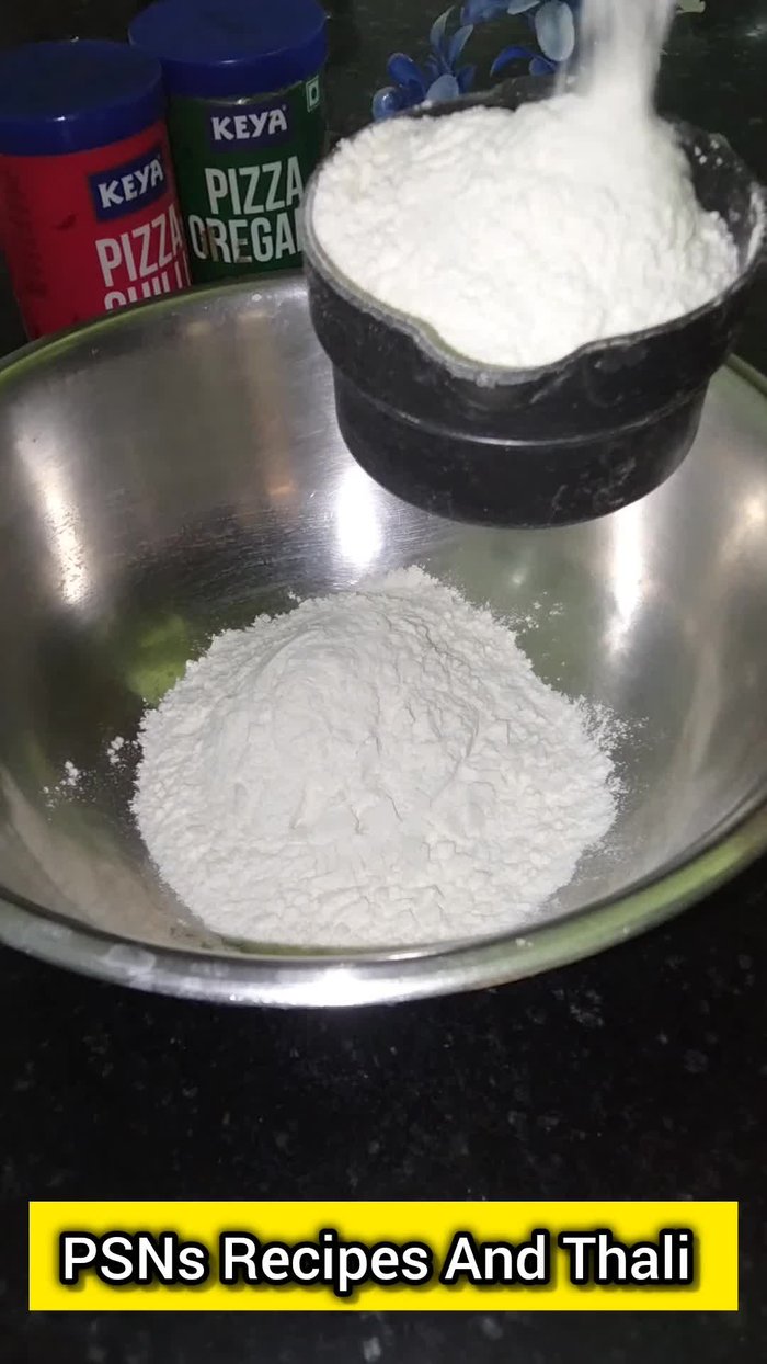 In a bowl, combine flour, salt, sugar, oil, and fresh curd. Mix well. (10.16)
