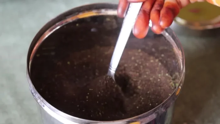 Let the milk bubble up to one side.