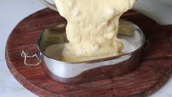 Pour the batter into your prepared baking tray/tin, ensuring to remove any air bubbles.