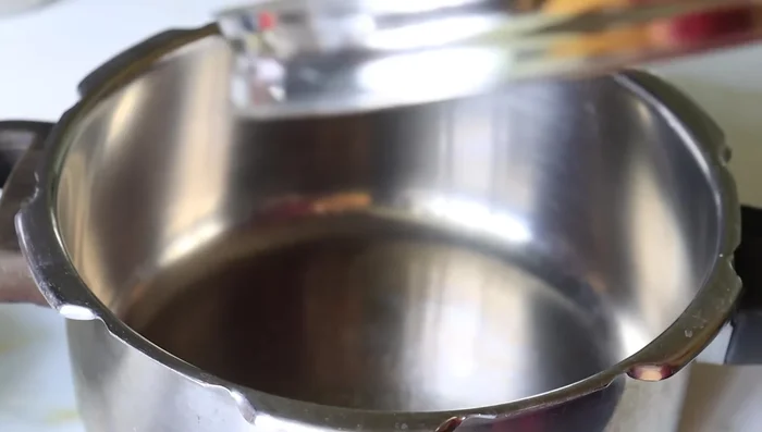 Heat a heavy-bottomed pan on high heat for 10 minutes, then reduce heat to low.