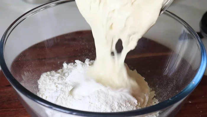 Grind this mixture into a fine paste. Add the semolina-sugar powder and mix well to ensure no lumps.