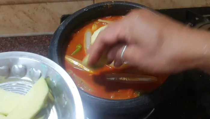 Add the chopped mango.