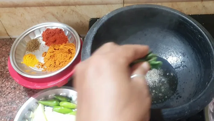 Roast fenugreek and mustard seeds until fragrant. Add curry leaves, sauté briefly.