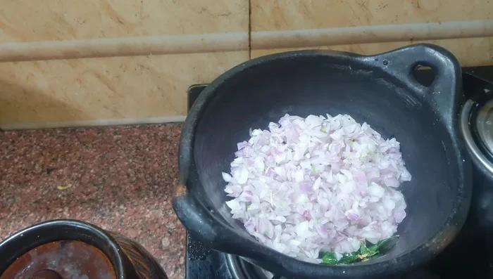 Add chopped onions and sauté until translucent.
