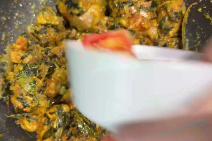 Make a well in the middle and add the tomatoes, cover and simmer for 10-15 minutes. Stir frequently.