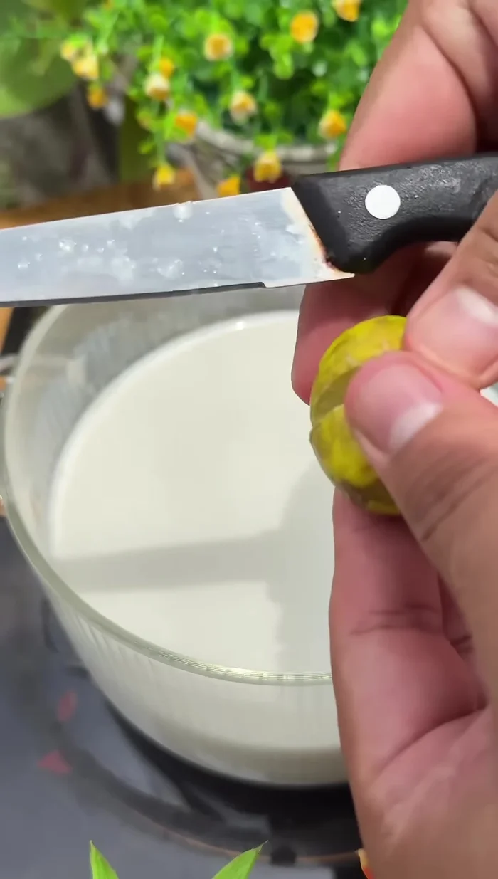 Add lemon to curdle the milk into chenna.
