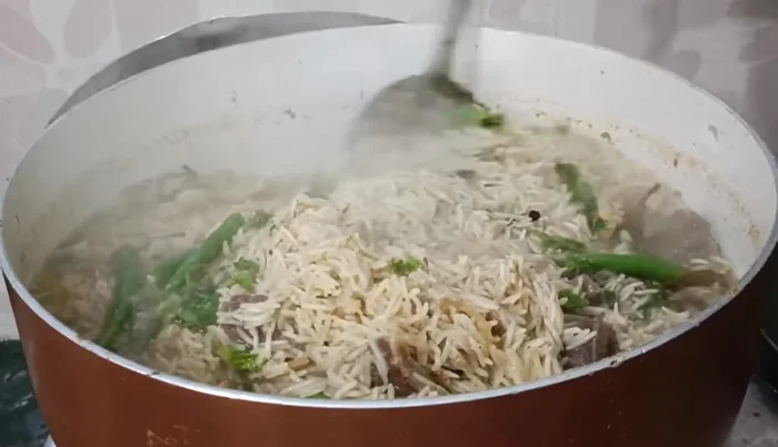 Bring to a boil, then reduce heat, cover, and steam until the rice is cooked.