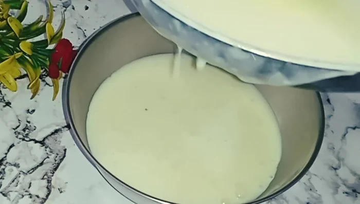 In a separate bowl, combine half of the prepared milk mixture with the toasted bread pieces.