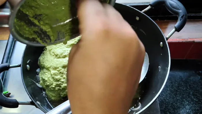 Add the ground spice paste and cook until oil separates. (393.36)