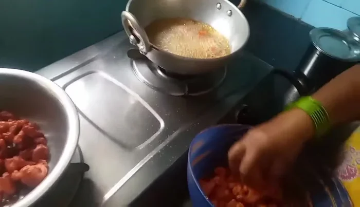 Mix the batter: In a bowl, combine the gram flour, spices (adjust to your taste), and enough water to form a smooth batter. The consistency should be slightly thicker than pancake batter.