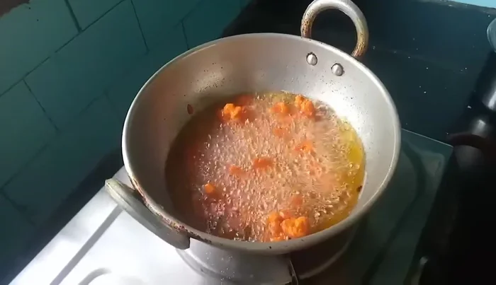 Coat the cauliflower: Dip each cauliflower floret into the batter, ensuring it's fully coated.