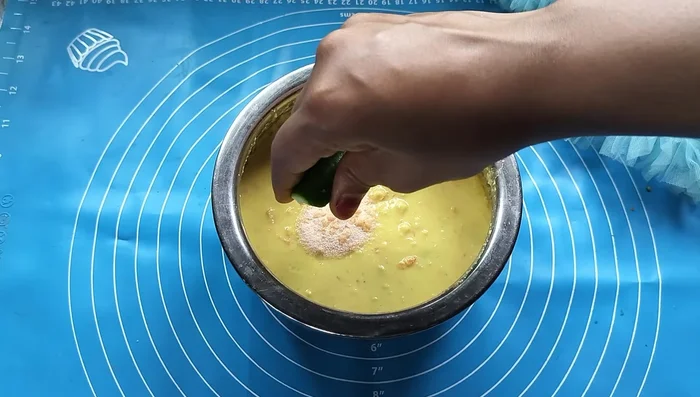 Just before steaming, add 1 teaspoon of Eno (baking soda) dissolved in 2 drops of water to the batter, and mix lightly. Do not over-mix.