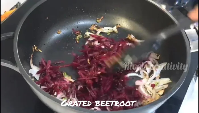 Add grated beetroot and cook on low flame for 3-4 minutes.