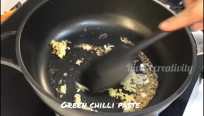 Add ginger-garlic paste, green chilies, and sliced onions. Fry until onions turn brown.