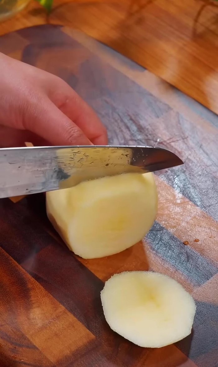Take an apple and cut it into small pieces.