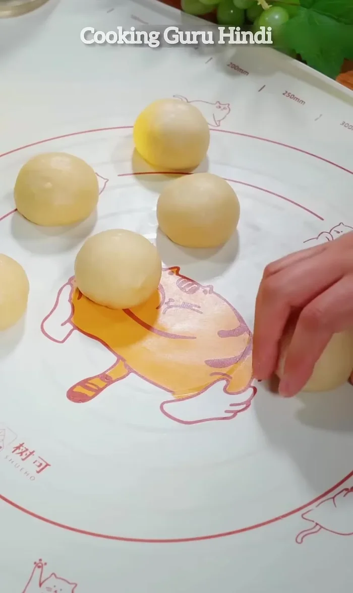 Roll each ball into a cow tongue shape.