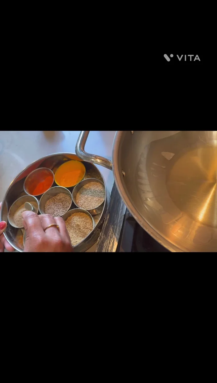 Add cumin seeds, turmeric powder, coriander powder, black pepper, cayenne pepper, and ginger.
